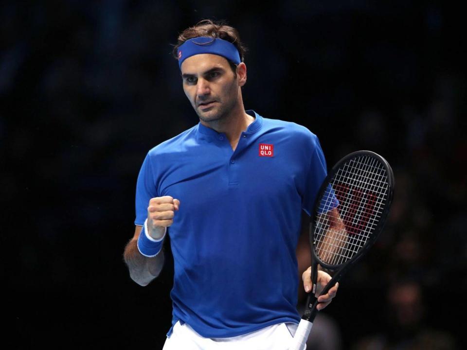 Federer is into the final four in London (PA)