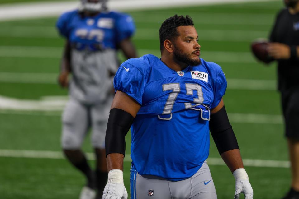 Lions offensive lineman Jonah Jackson participates during a team practice at Ford Field on Saturday, Aug. 7, 2021.