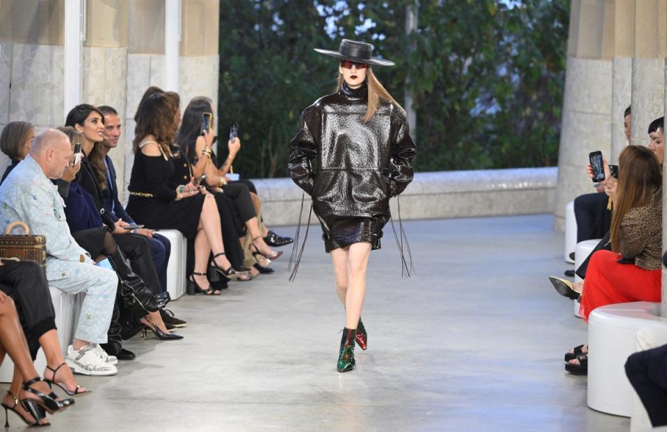 A model on the catwalk at the Louis Vuitton show (AFP via Getty Images)