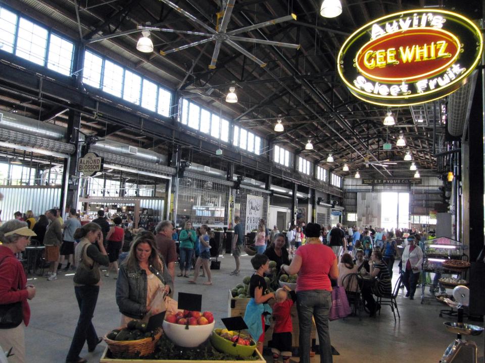 Pybus Public Market in Wenatchee, Washington is home to the seasonal farmers market and about 20 year-round restaurants and shops. (AP Photo/Shannon Dininny)
