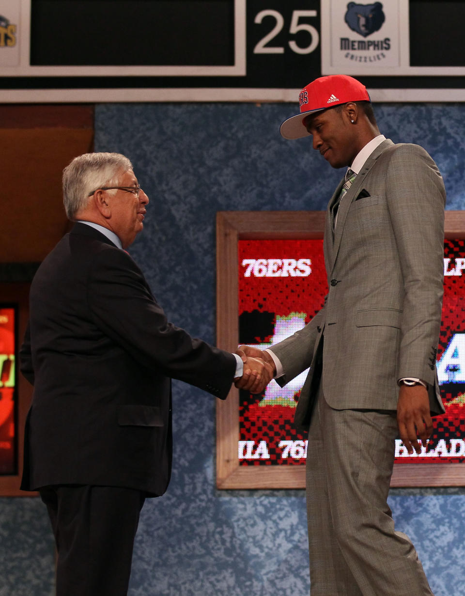 NEWARK, NJ - JUNE 28: Moe Harkless (R) of St. John's Red Storm greets NBA Commissioner David Stern (L) after he was selected number fifteen overall by the Philadelphia 76ers during the first round of the 2012 NBA Draft at Prudential Center on June 28, 2012 in Newark, New Jersey. NOTE TO USER: User expressly acknowledges and agrees that, by downloading and/or using this Photograph, user is consenting to the terms and conditions of the Getty Images License Agreement. (Photo by Elsa/Getty Images)