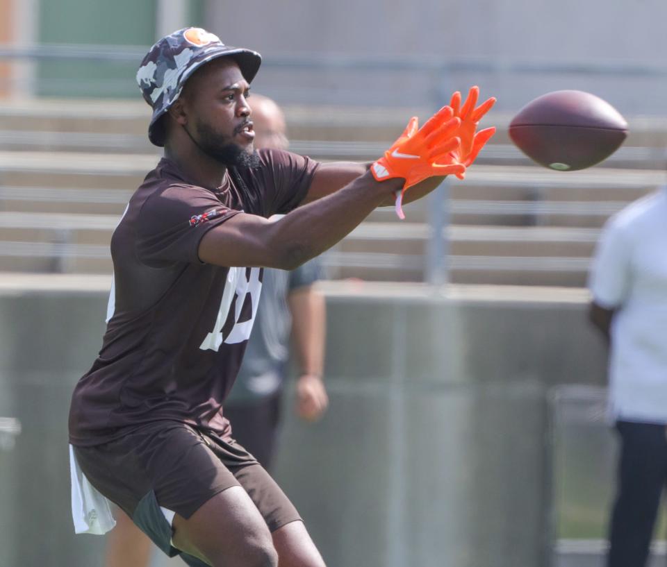 Cleveland Browns rookie receiver David Bell catches a pass during minicamp on Wednesday, June 15, 2022 in Canton, Ohio, at Tom Benson Hall of Fame Stadium.
