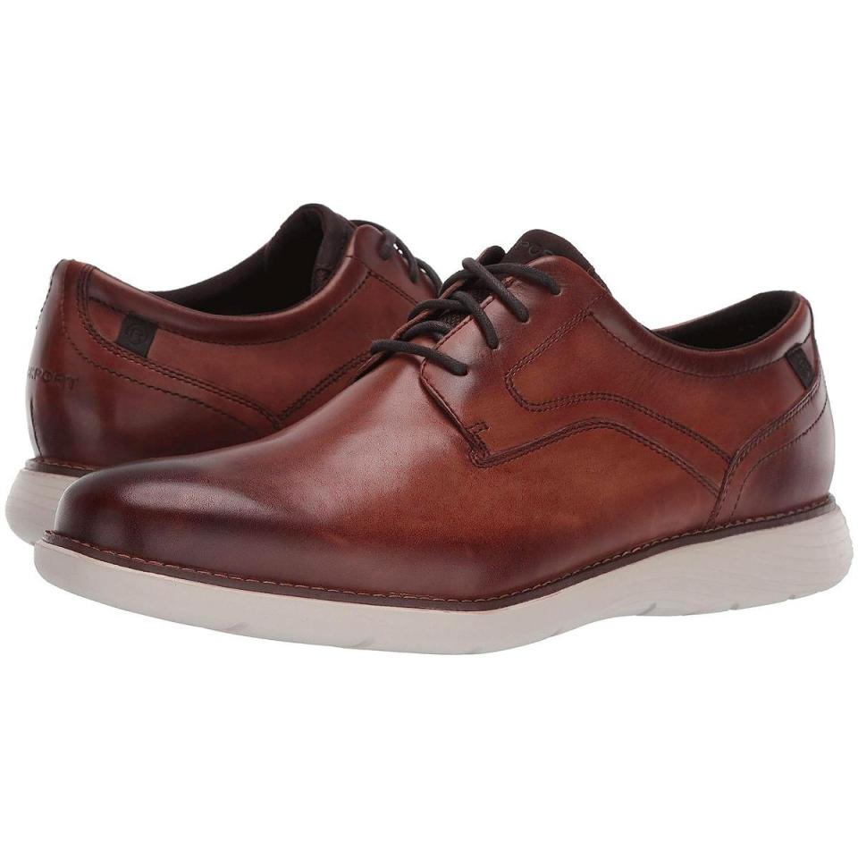 <p><a href="https://go.redirectingat.com?id=74968X1596630&url=https%3A%2F%2Fwww.zappos.com%2Fp%2Frockport-garett-plain-toe-cognac%2Fproduct%2F9177149&sref=https%3A%2F%2F" rel="nofollow noopener" target="_blank" data-ylk="slk:Shop Now;elm:context_link;itc:0;sec:content-canvas" class="link ">Shop Now</a></p><p>Garett Plain Toe</p><p>zappos.com</p><p>$79.95</p>