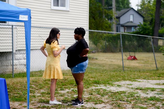 Stevens chats with Pontiac City Councilwoman Melanie Rutherford at the New Springfield Missionary Baptist Church in Pontiac. (Photo: Brittany Greeson for HuffPost)