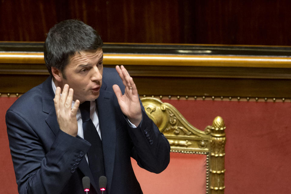 Premier Matteo Renzi delivers his speech prior to a confidence vote, at the Senate, in Rome, Monday, Feb. 24, 2014. Renzi, Italy's youngest premier, is heading a new government he says promises will swiftly tackle old problems.(AP Photo/Andrew Medichini)