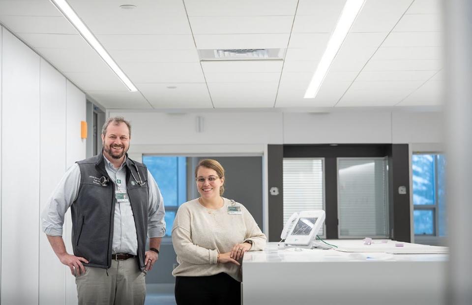 Richard Saunders, MD, and Michelle Graham, RN, stand in the new Medical Specialty Care Unit (MSCU) in the new Patient Pavilion at Dartmouth Hitchcock Medical Center.