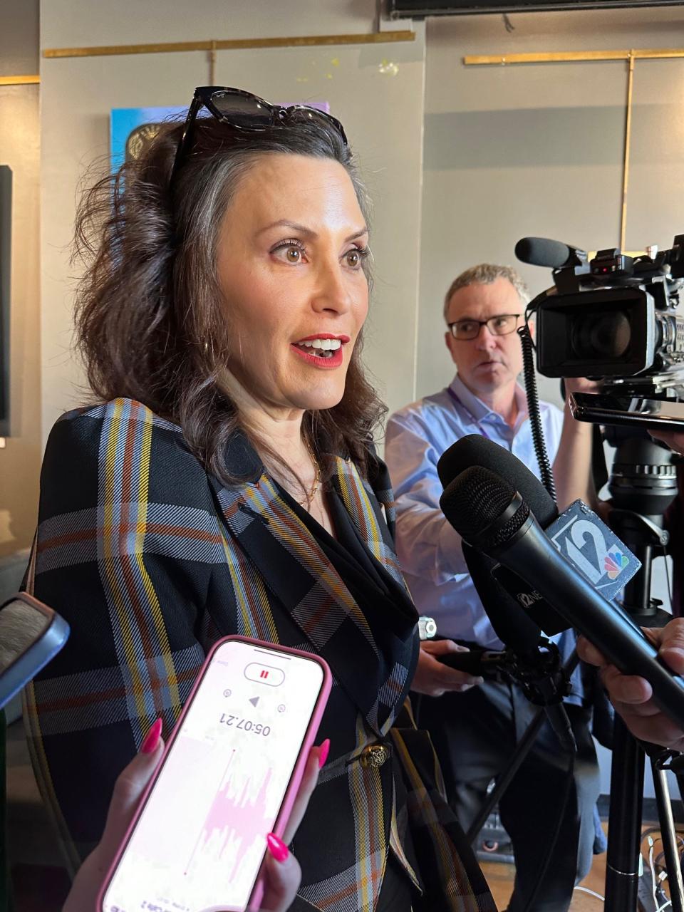 Michigan Gov. Gretchen Whitmer speaks to reporters following a campaign event Phoenix on April 3, 2024.