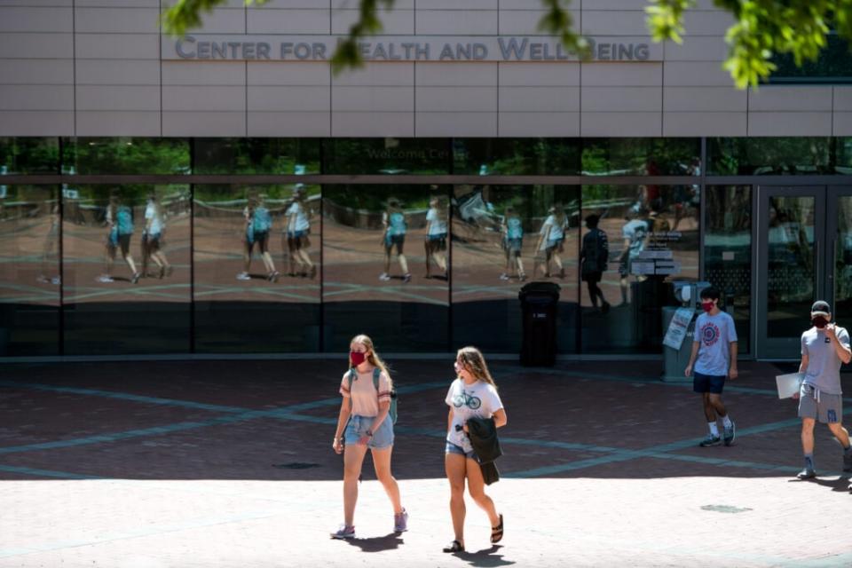 Students walk in front of the Center for Health and Well Being on campus at the University of South Carolina on September 3, 2020 in Columbia, South Carolina. (Photo by Sean Rayford/Getty Images)