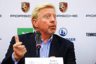 Three-times Wimbledon champion Boris Becker gestures as he is announced as German Tennis Federation's (DTB) new head of men's tennis during a news conference in Frankfurt, Germany, August 23, 2017. REUTERS/Kai Pfaffenbach