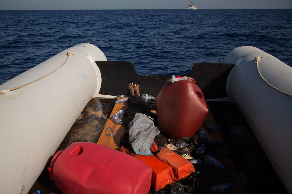 <p>The lifeless body of Maoulit, 19, from Somalia, is seen inside an dinghy after being evacuated by members of Proactiva Open Arms NGO, during a rescue operation at the Mediterranean sea, about 17 miles north of Sabratah, Libya, Saturday, Aug. 20, 2016. Migrants seemingly prefer to face the dangers of the journey towards Europe, rather than stay at home.(AP Photo/Emilio Morenatti) </p>
