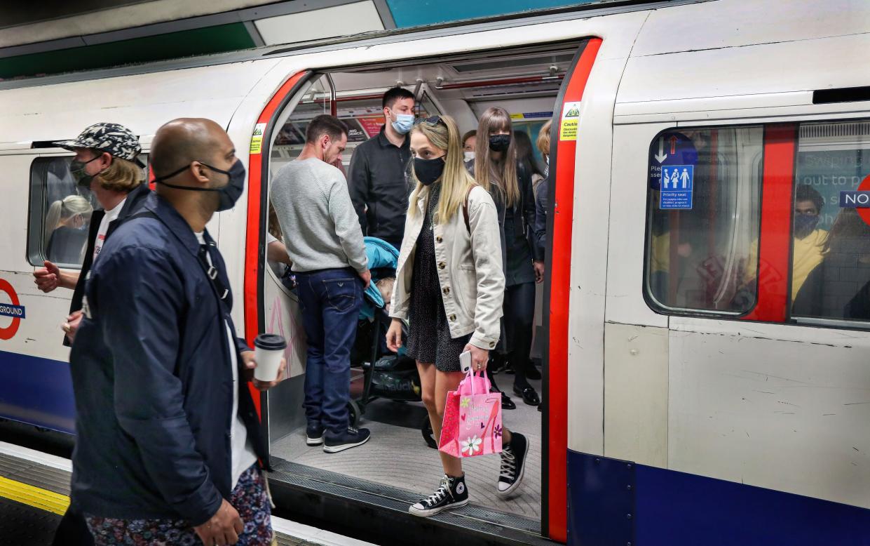 People wear face masks on London Underground - Martin Pope/SOPA Images/LightRocket via Getty Images