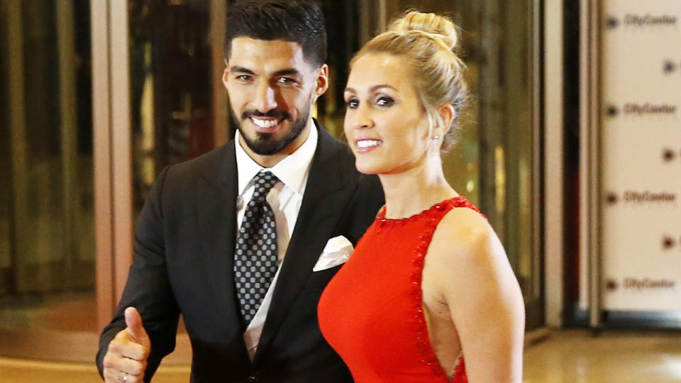 Luis Suarez and wife Sofia Balbi, pictured here at the wedding of Lionel Messi and Antonela Rocuzzo in 2017.