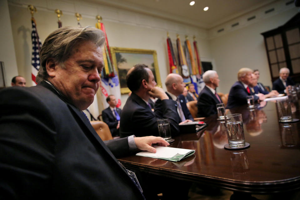 Steve Bannon, left, at a meeting between President Trump and congressional leaders in February, when he was Trump’s chief strategist. (Photo: Carlos Barria/Reuters)