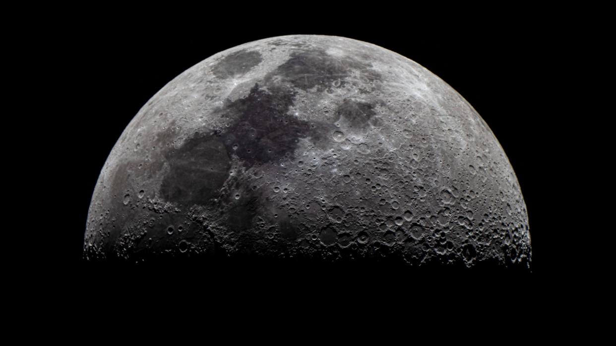  The moon seen against the blackness of space. 