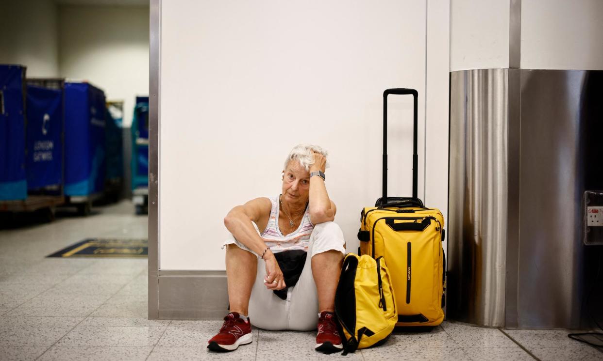 <span>Nearly 7,000 flights were cancelled around the world on Friday.</span><span>Photograph: Benjamin Cremel/AFP/Getty Images</span>