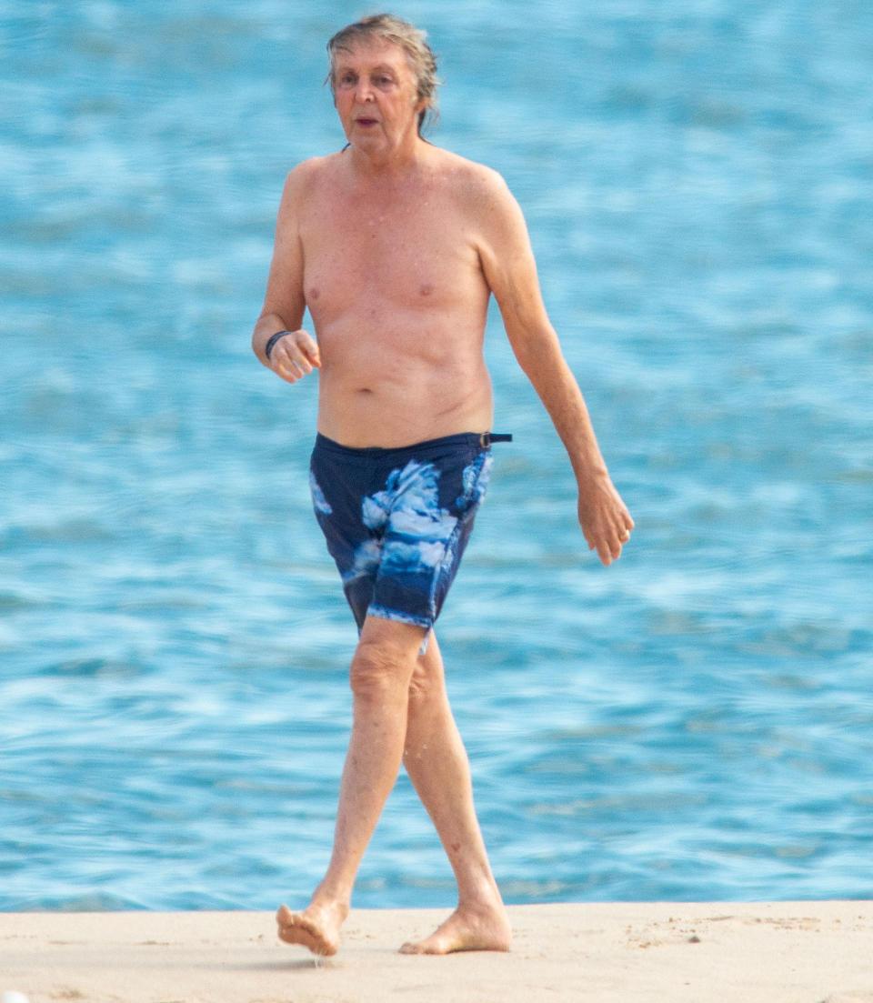 <p>Paul McCartney is seen taking a stroll on the beach after swimming on Sunday in the Hamptons. </p>