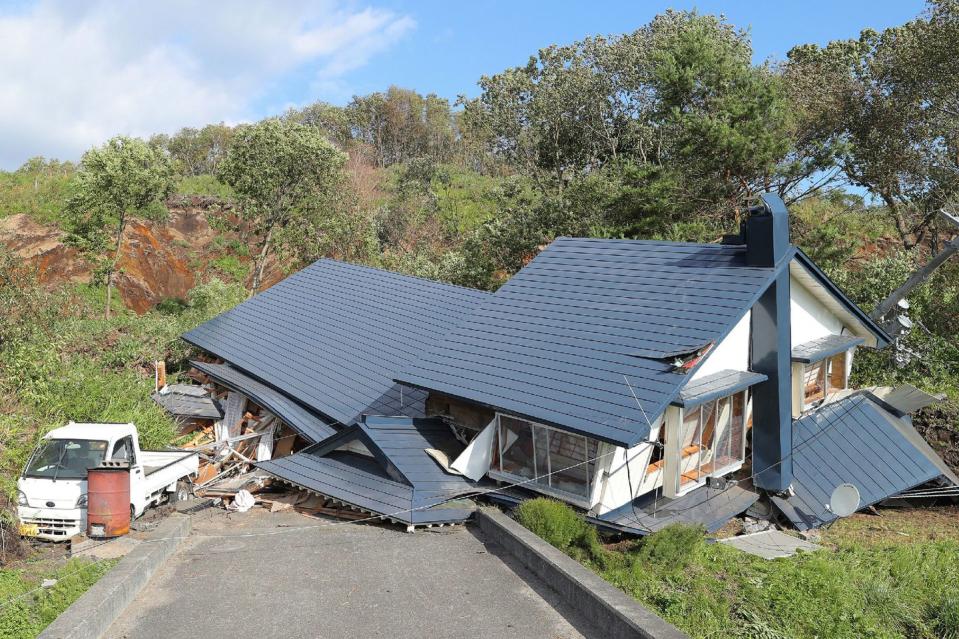 <p>A house appears severely damaged due to a landslide caused by the earthquake in Atsuma town.</p>