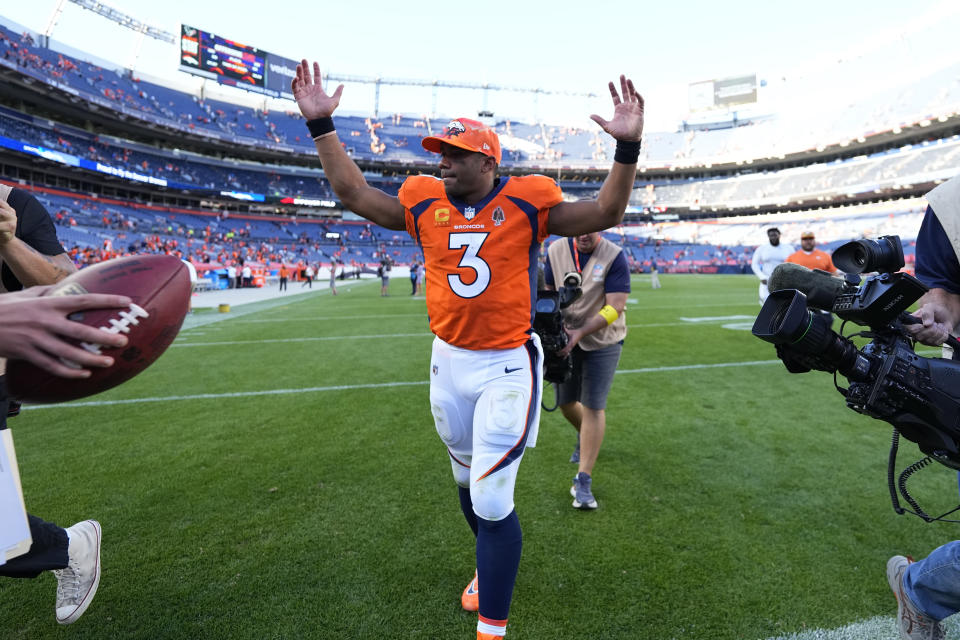 Denver Broncos quarterback Russell Wilson (3) leaves the field after an NFL football game, against the Houston Texans, Sunday, Sept. 18, 2022, in Denver. The Broncos defeated the Texans 16-9. (AP Photo/Jack Dempsey)