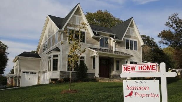 A real estate sign advertising a new home for sale in Vienna, Virginia