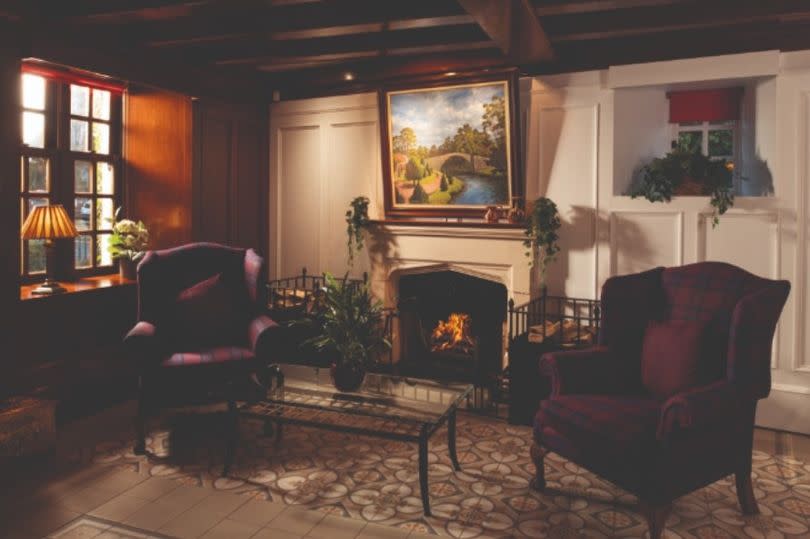 Picture yourself and a companion, enjoying a malt whisky by this roaring fireplace