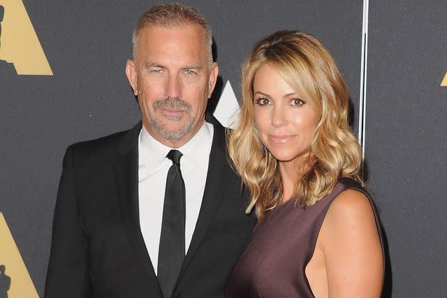 <p>Jon Kopaloff/FilmMagic</p> Kevin Costner and Christine Baumgartner in 2014