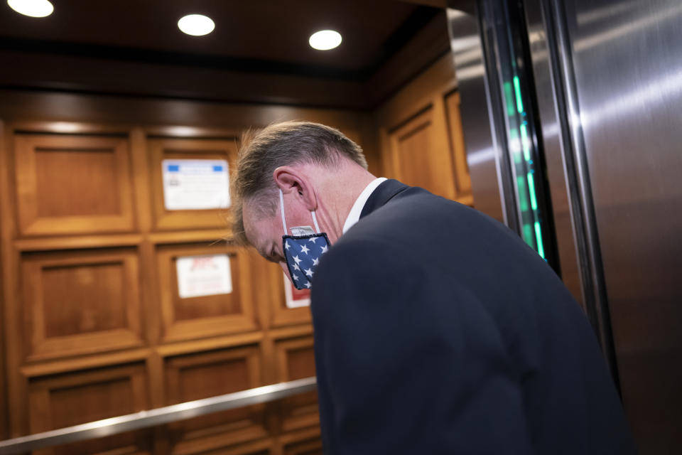 Rep. Paul Gosar, R-Ariz., boards an elevator as the House of Representatives prepares to vote on a resolution to formally rebuke him for tweeting an animated video that depicted him striking Rep. Alexandria Ocasio-Cortez, D-N.Y., with a sword, on Capitol Hill in Washington, Wednesday, Nov. 17, 2021. In addition to the official censure, House Democrats want to oust him from his seats on the House Oversight Committee and the Natural Resources Committee. (AP Photo/J. Scott Applewhite)