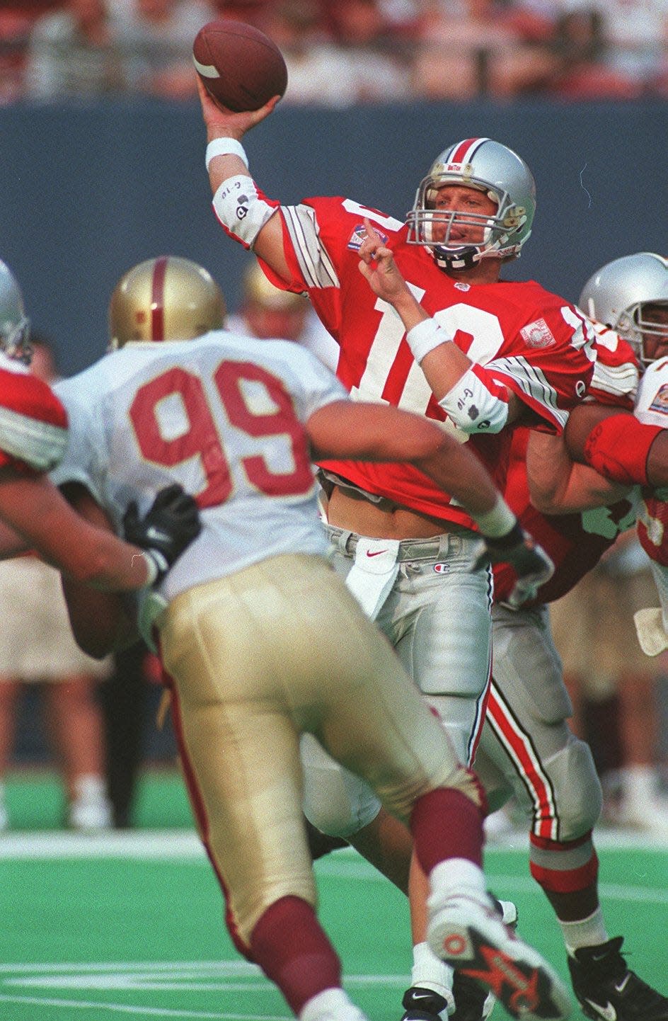 OSU quarterback Tom Hoying attempts a pass against Boston College on Aug. 27, 1995.