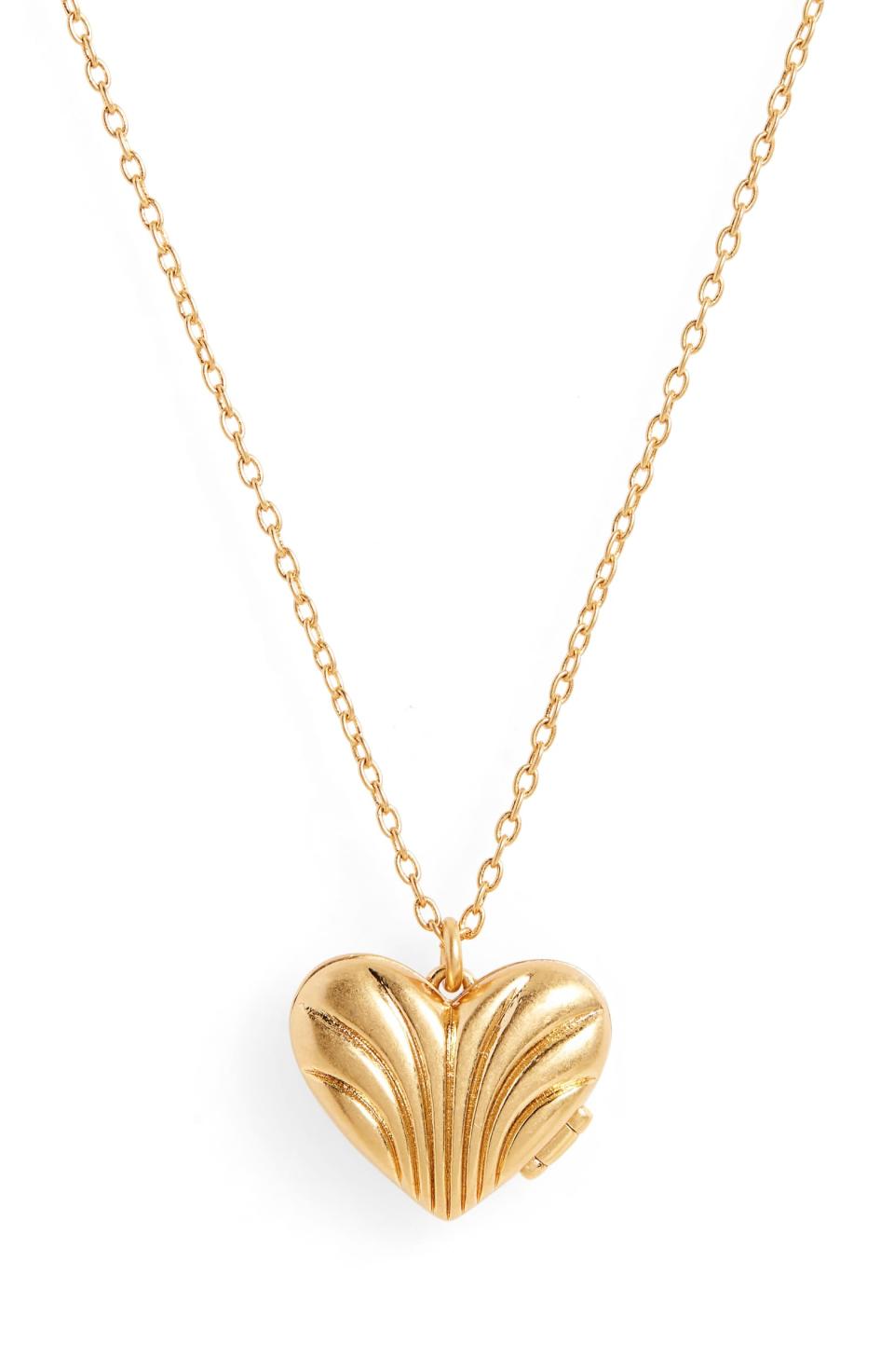 Madewell Carved Heart Locket Pendant Necklace. Image via Nordstrom.