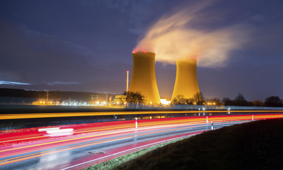 Steam rises from the cooling towers of the Grohnde nuclear power plant near Grohnde, Germany, Wednesday, Dec. 29, 2021. Germany on Friday, Dec. 31, 2021 is shutting down half of the six nuclear plants it still has in operation, a year before the country draws the final curtain on its decades-long use of atomic power. (Julian Stratenschulte/dpa via AP)