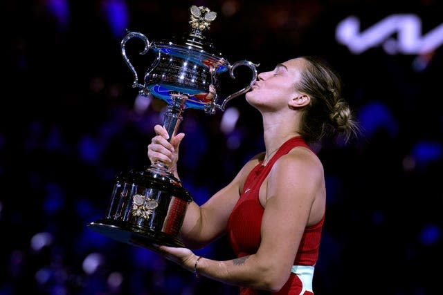 Aryna Sabalenka kisses the Daphne Akhurst Memorial Cup