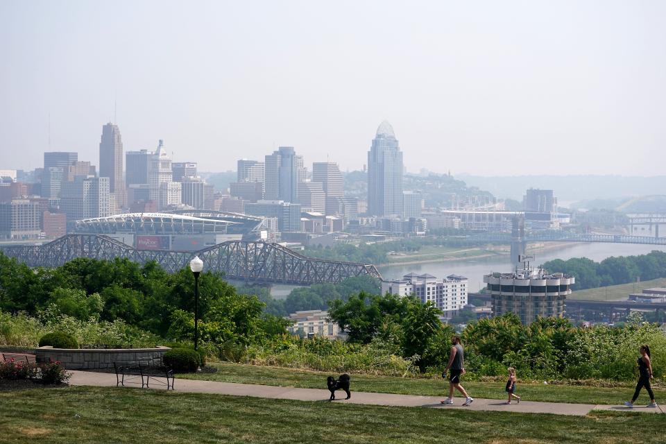 Smoke from wildfires in Canada have drifted southward to Cincinnati, causing the air to appear hazy, Tuesday, June 6, 2023. Although the Southwest Ohio Air Quality Agency has not issued another air quality alert, the National Air Quality Index has Greater Cincinnati and Northern Kentucky in the orange and red zones, indicating that the air is unhealthy, mainly for sensitive groups.