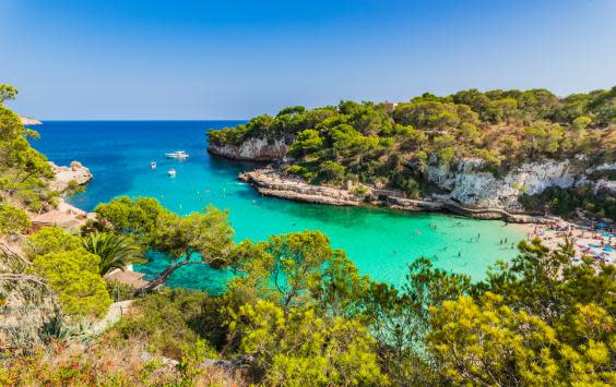 Cala Llombards has green-blue waters (Getty/iStock)