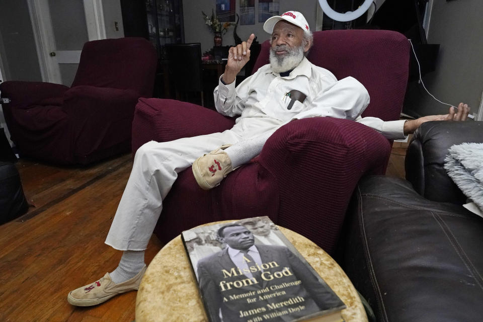 James Meredith, who integrated the University of Mississippi as its first Black student in 1962, reflects on his efforts to dismantle white supremacy and his mission to promote religious revival, at his home in Jackson, Miss., Thursday, Oct. 28, 2021. A person close to Meredith is selling “New Miss” merchandise and trying to trademark a logo with cursive script that is nearly identical to the university's Ole Miss logo. The university is fighting the trademark effort. (AP Photo/Rogelio V. Solis)