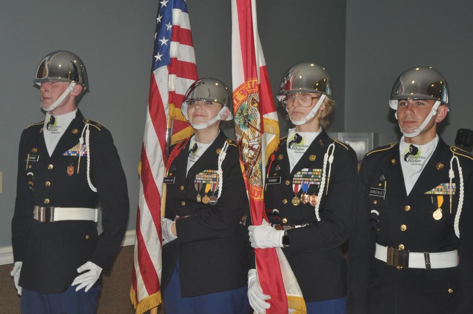 Students from Palmetto Ridge High School presented the colors during the ceremony to commemorate the 80th anniversary of the bombing of Pearl Harbor. Local veterans, Purple Heart winners and other dignitaries attended the event Dec. 7, 2021, at New Hope Ministries in East Naples. (Photo by Andrea Stetson)