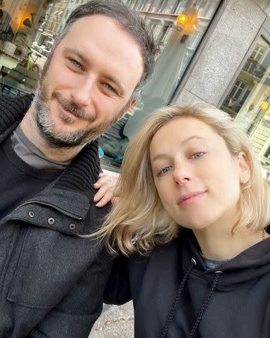 Iliza Shlesinger Instagram Iliza Shlesinger takes a photo with her husband Noah Galuten.