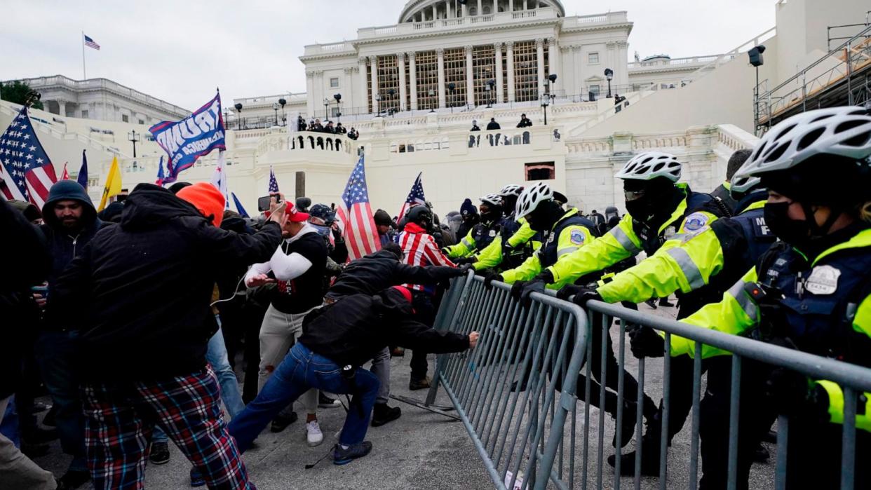 PHOTO: Rioters loyal to President Donald Trump rally at the U.S. Capitol in Washington on Jan. 6, 2021. (Julio Cortez/AP, FILE)