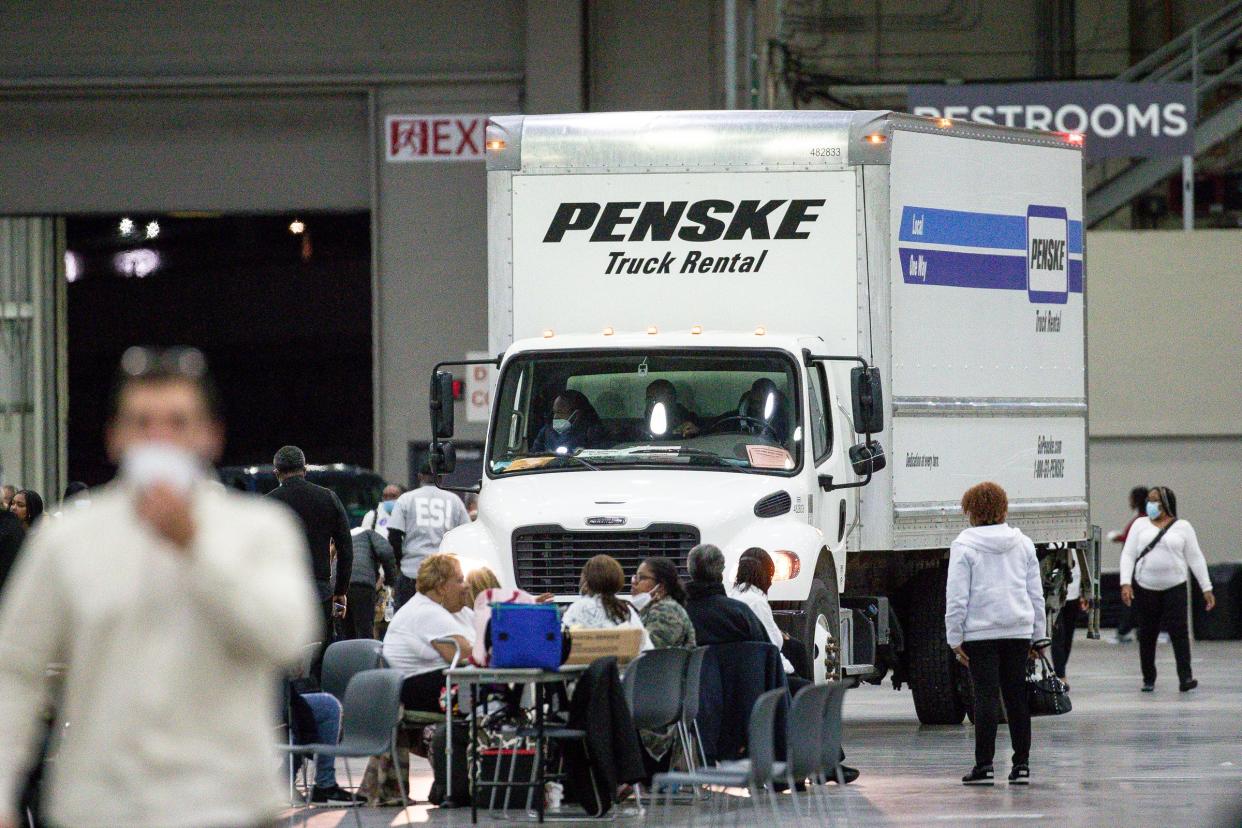 A truck delivers a load of absentee ballots to the Huntington Place in Detroit, where Midterm election votes are being tabulated on Tuesday, Nov. 8, 2022.