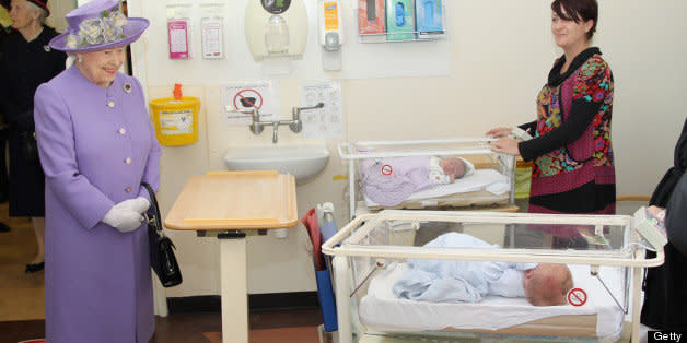 STEVENAGE, ENGLAND - JUNE 14:  Queen Elizabeth II meets newborn babies as she visits a new maternity ward at the Lister Hospital on June 14, 2012 in Stevenage, England. The Queen is on a two day tour of the East Midlands as part of her Diamond Jubilee tour of the country.  (Photo by Chris Jackson - WPA Pool/Getty Images)