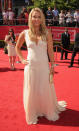 U.S. skier Lindsey Vonn manages to make knit caps and parkas glamorous so it was no surprise that she scorched the red carpet at the ESPYs in a simple but elegant white gown and Daniel Swarovski's gold iguana clutch 'Greta' with a crystal clasp. (Photo by Steve Granitz/WireImage)