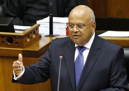 Pravin Gordhan delivers his 2014 budget address in Parliament in Cape Town February 26, 2014. REUTERS/Mike Hutchings