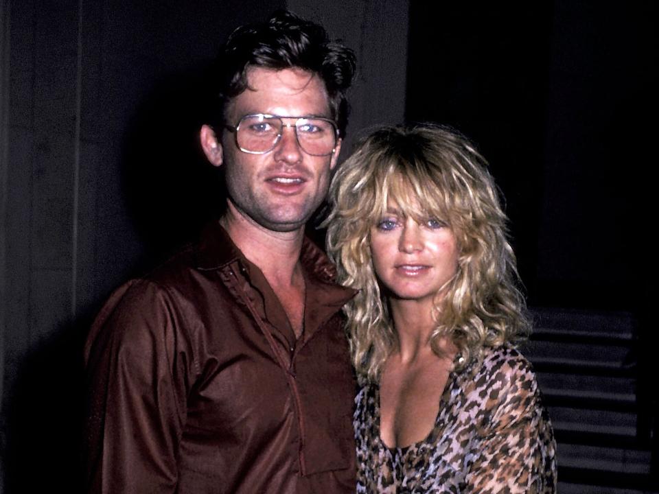 Kurt Russell and actress Goldie Hawn on July 23, 1983 leave the Carlyle Hotel for a night out in New York City