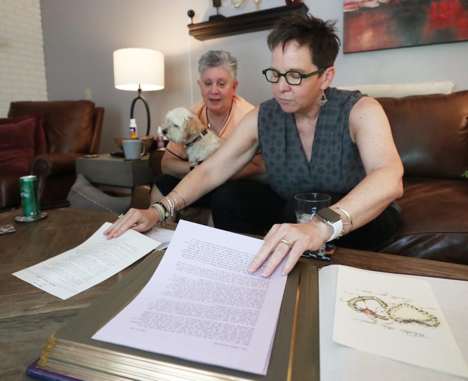 Ellen and Wendy McWilliams-Woods show the letter that they sent friends and family about their decision to have a commitment ceremony in 1993, before same-sex marriage was legal.