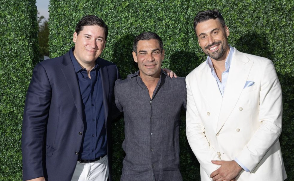 During the $6,000-per-person pop-up Once Upon a Kitchen, event coordinators Barnabas Carrega (left) and Luca Pavanelli (right) from hospitality group Gr8 Experience pose with Miami Mayor Francis Suarez (center). Instagram