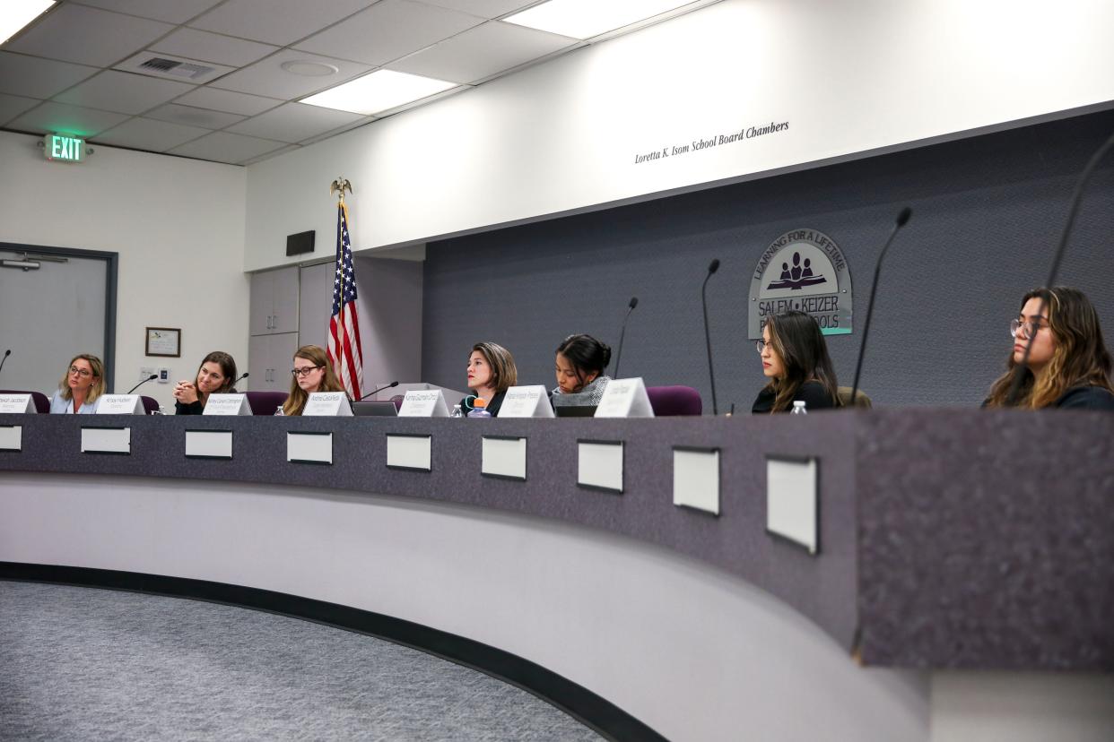 The Salem-Keizer School Board discusses proposed district layoffs during a meeting Monday night. The board Tuesday night approved laying off about 400 employees.