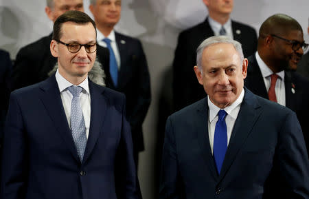 FILE PHOTO: Poland's Prime Minister Mateusz Morawiecki and Israel's Prime Minister Benjamin Netanyahu look on during the Middle East summit in Warsaw, Poland, February 14, 2019. REUTERS/Kacper Pempel/File Photo