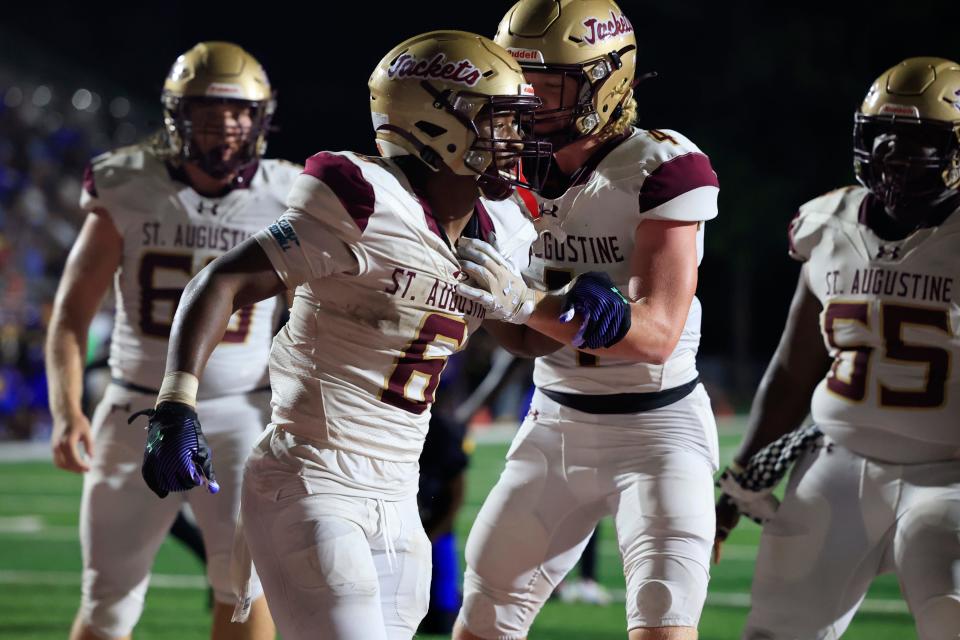 St. Augustine's Devonte Lyons (6) reacts to scoring a touchdown during the third quarter against Brunswick on Sept. 9.