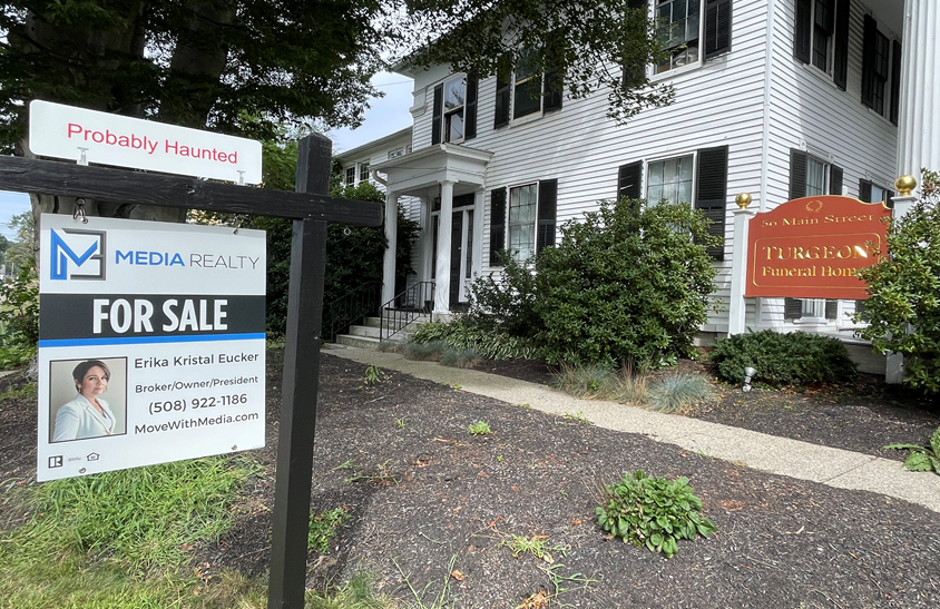 The Turgeon Funeral Home at 56 Main Street in Millbury, Massachusetts was listed for sale on September 20, 2023 and the for sale sign out front of the property reads, 'Probably haunted'.
(Credit: Erika Kristal Eucker)
