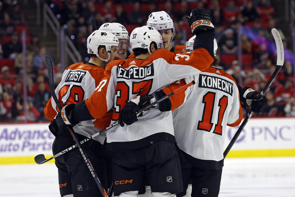 Philadelphia Flyers celebrate a goal by Owen Tippett against the Carolina Hurricanes during the first period of an NHL hockey game in Raleigh, N.C., Wednesday, Nov. 15, 2023. (AP Photo/Karl B DeBlaker)