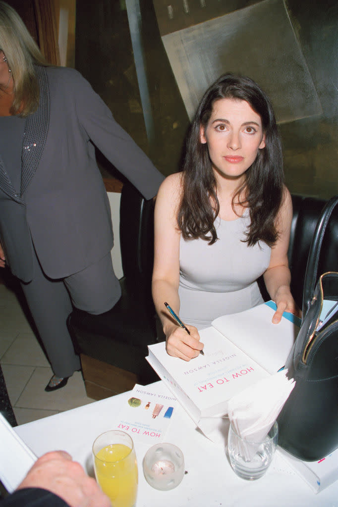 A young looking Nigella Lawson signing copies of her her first cook book, 'How To Eat' in 1998. (Getty Images)