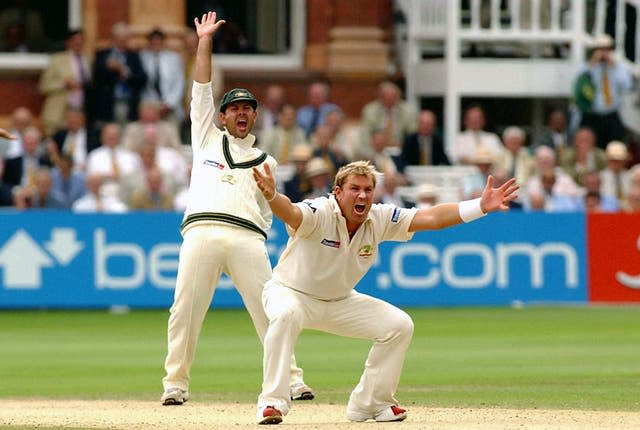 Warne, right, and Ricky Ponting unsuccessfully appeal for the wicket of England’s Andrew Strauss 